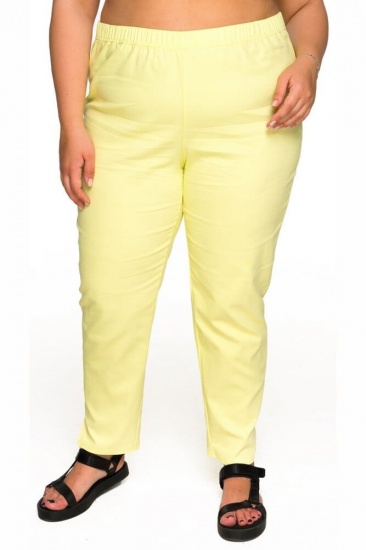 Зауженные брюки с разрезами снизу, желтые